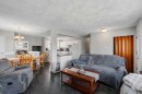 249 Acadia Drive Se, Calgary, AB  - Indoor Photo Showing Living Room 