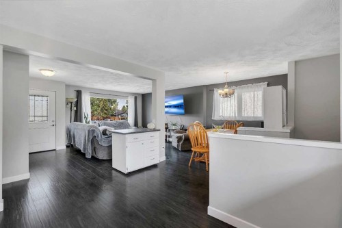 249 Acadia Drive Se, Calgary, AB - Indoor Photo Showing Living Room