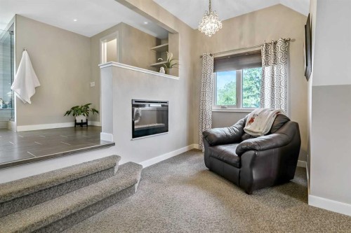 39 Canova Close Sw, Calgary, AB - Indoor With Fireplace
