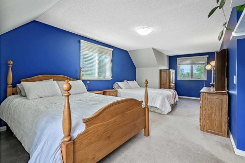 39 Canova Close Sw, Calgary, AB - Indoor Photo Showing Bedroom