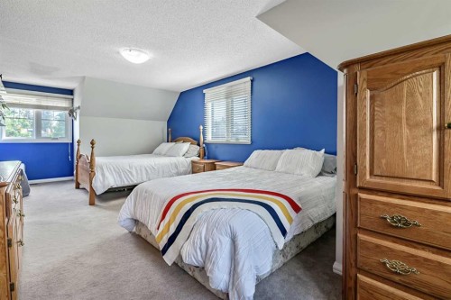 39 Canova Close Sw, Calgary, AB - Indoor Photo Showing Bedroom