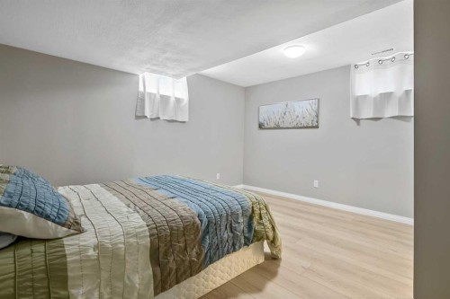 39 Canova Close Sw, Calgary, AB - Indoor Photo Showing Bedroom