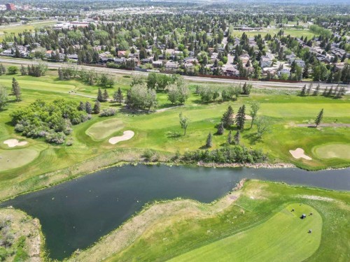 39 Canova Close Sw, Calgary, AB - Outdoor With Body Of Water With View