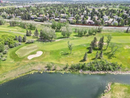 39 Canova Close Sw, Calgary, AB - Outdoor With Body Of Water With View