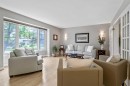 39 Canova Close Sw, Calgary, AB  - Indoor Photo Showing Living Room 