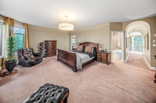 40 Blueridge Bay, Rural Rocky View County, AB - Indoor Photo Showing Bedroom