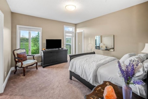 40 Blueridge Bay, Rural Rocky View County, AB - Indoor Photo Showing Bedroom