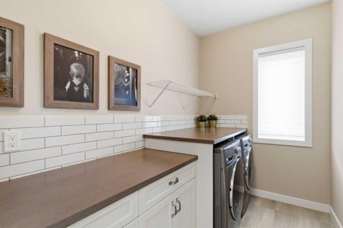 134 Cranbrook Circle Se, Calgary, AB - Indoor Photo Showing Laundry Room