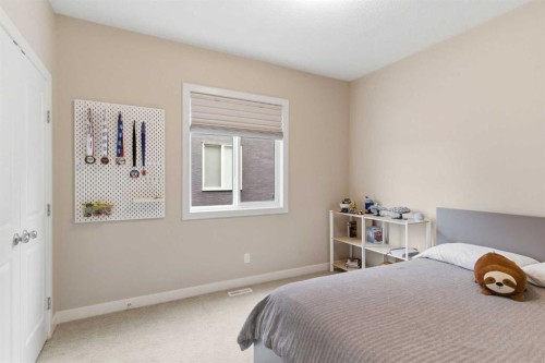 134 Cranbrook Circle Se, Calgary, AB - Indoor Photo Showing Bedroom