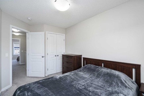 849 Mahogany Boulevard Se, Calgary, AB - Indoor Photo Showing Bedroom