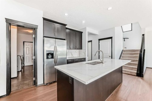 114 Autumn Circle Se, Calgary, AB - Indoor Photo Showing Kitchen With Double Sink With Upgraded Kitchen