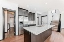 114 Autumn Circle Se, Calgary, AB  - Indoor Photo Showing Kitchen With Double Sink With Upgraded Kitchen 