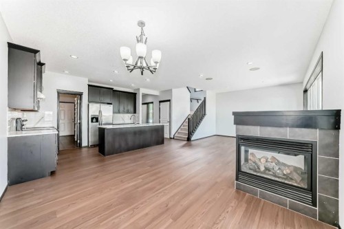 114 Autumn Circle Se, Calgary, AB - Indoor With Fireplace