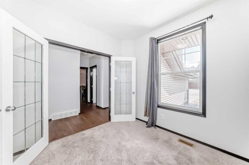 114 Autumn Circle Se, Calgary, AB - Indoor Photo Showing Other Room