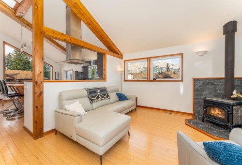 132 Settler Way, Canmore, AB - Indoor Photo Showing Living Room With Fireplace