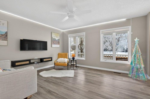 1012 Windsong Drive Sw, Airdrie, AB - Indoor Photo Showing Living Room