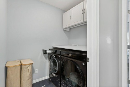 1012 Windsong Drive Sw, Airdrie, AB - Indoor Photo Showing Laundry Room