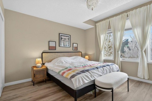 1012 Windsong Drive Sw, Airdrie, AB - Indoor Photo Showing Bedroom