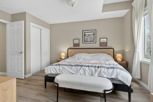 1012 Windsong Drive Sw, Airdrie, AB - Indoor Photo Showing Bedroom