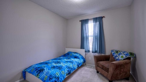 20 Tuscany Valley Park Nw, Calgary, AB - Indoor Photo Showing Bedroom