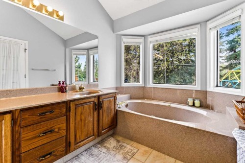 876 Shawnee Drive Sw, Calgary, AB - Indoor Photo Showing Bedroom