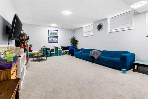 876 Shawnee Drive Sw, Calgary, AB - Indoor With Fireplace