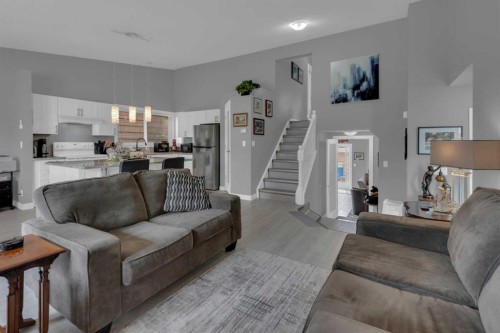 67 Deersaxon Circle Se, Calgary, AB - Indoor Photo Showing Living Room