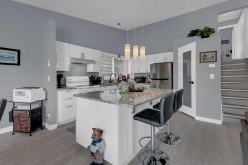67 Deersaxon Circle Se, Calgary, AB - Indoor Photo Showing Kitchen