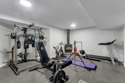 46 Wilson Road Ne, Langdon, AB - Indoor Photo Showing Gym Room
