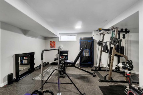 46 Wilson Road Ne, Langdon, AB - Indoor Photo Showing Gym Room