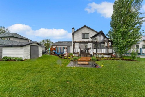 46 Wilson Road Ne, Langdon, AB - Outdoor With Deck Patio Veranda