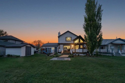 46 Wilson Road Ne, Langdon, AB - Outdoor With Deck Patio Veranda With Facade