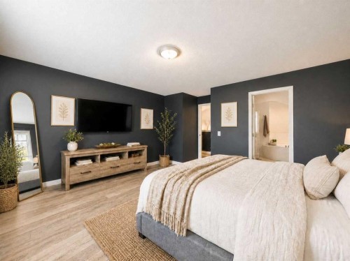 129 Cimarron Grove Circle, Okotoks, AB - Indoor Photo Showing Bedroom