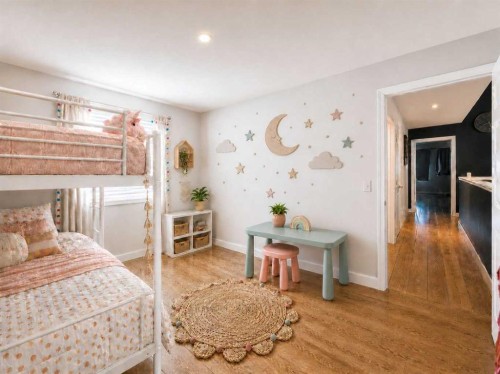 129 Cimarron Grove Circle, Okotoks, AB - Indoor Photo Showing Bedroom