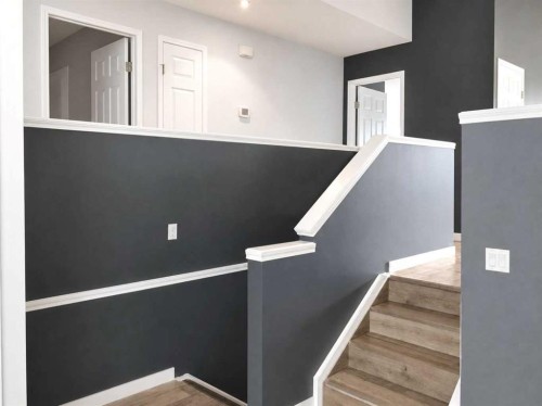 129 Cimarron Grove Circle, Okotoks, AB - Indoor Photo Showing Other Room