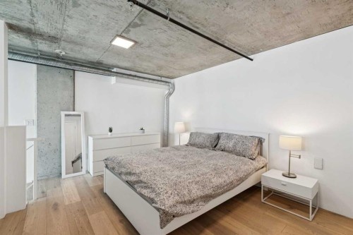 511-535 8 Avenue Se, Calgary, AB - Indoor Photo Showing Bedroom