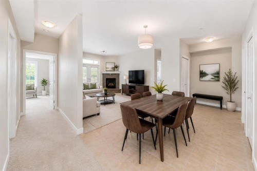 210-1005A Westmount Drive, Strathmore, AB - Indoor With Fireplace