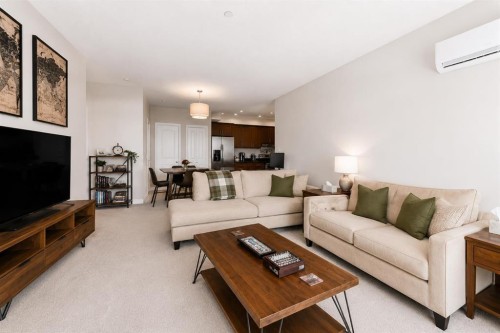 210-1005A Westmount Drive, Strathmore, AB - Indoor Photo Showing Living Room