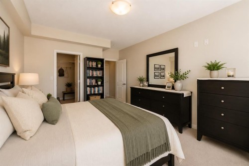 210-1005A Westmount Drive, Strathmore, AB - Indoor Photo Showing Bedroom