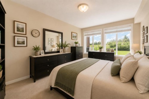 210-1005A Westmount Drive, Strathmore, AB - Indoor Photo Showing Bedroom