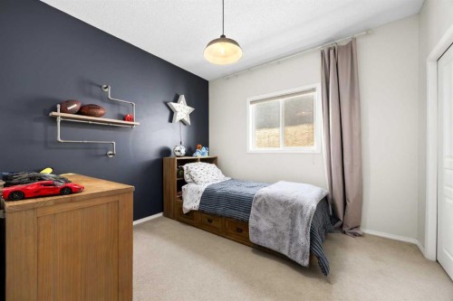 138 Cranwell Close Se, Calgary, AB - Indoor Photo Showing Bedroom