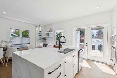4747 26 Avenue Sw, Calgary, AB - Indoor Photo Showing Kitchen With Double Sink With Upgraded Kitchen