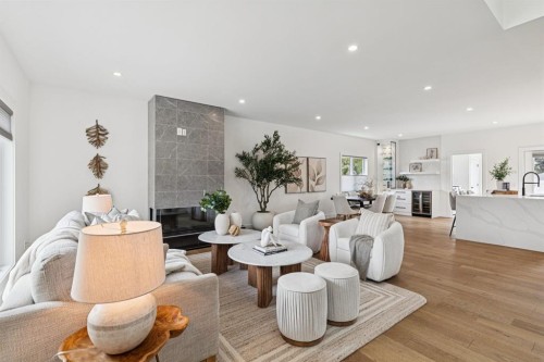 4747 26 Avenue Sw, Calgary, AB - Indoor Photo Showing Living Room With Fireplace