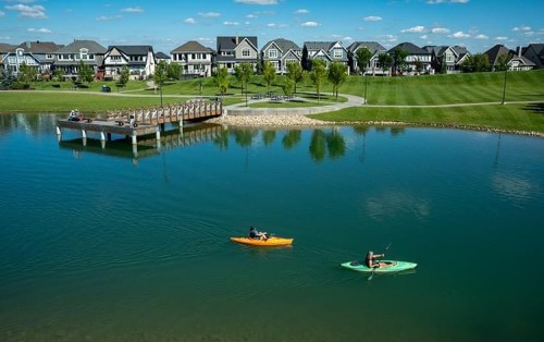 648 Mahogany Boulevard Se, Calgary, AB - Outdoor With Body Of Water