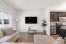 648 Mahogany Boulevard Se, Calgary, AB  - Indoor Photo Showing Living Room 
