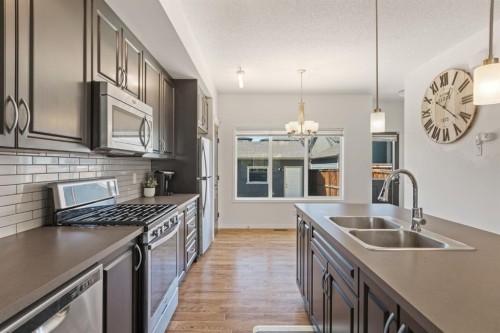 648 Mahogany Boulevard Se, Calgary, AB - Indoor Photo Showing Kitchen With Double Sink With Upgraded Kitchen