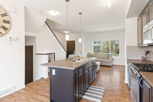648 Mahogany Boulevard Se, Calgary, AB - Indoor Photo Showing Kitchen With Double Sink With Upgraded Kitchen