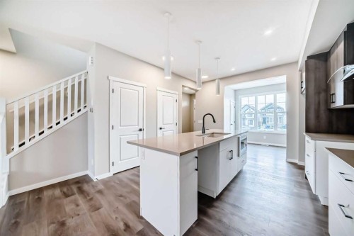 23 Magnolia Street Se, Calgary, AB - Indoor Photo Showing Kitchen With Upgraded Kitchen