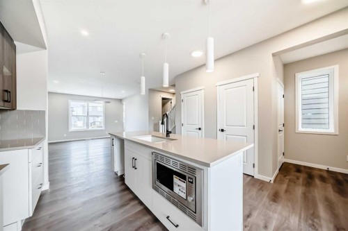 23 Magnolia Street Se, Calgary, AB - Indoor Photo Showing Kitchen With Upgraded Kitchen