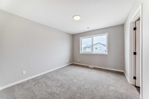23 Magnolia Street Se, Calgary, AB - Indoor Photo Showing Other Room